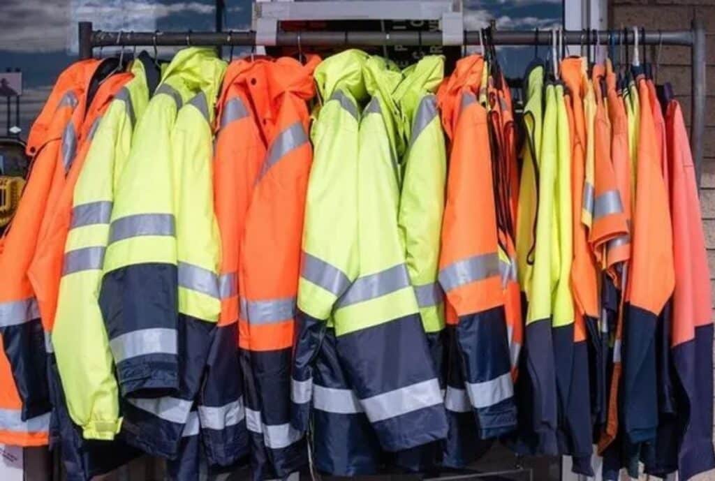 Modern smart jacket equipped with integrated sensors and connectivity features designed for workplace safety and efficiency.