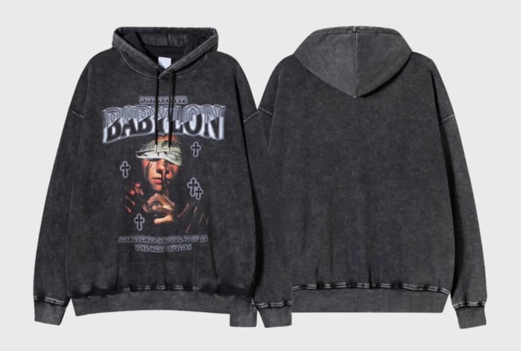 A premium hoodie from Fashion Soul International displayed in a minimalist studio, featuring plush fleece, refined logo embroidery, and subtle metallic hardware.