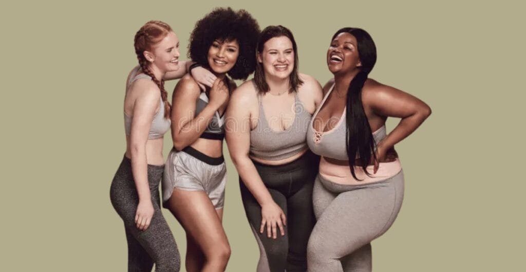 Image showing a diverse group of people, all wearing comfortable plus-size leggings in various colors and poses, smiling and posing confidently in a bright, casual studio.
