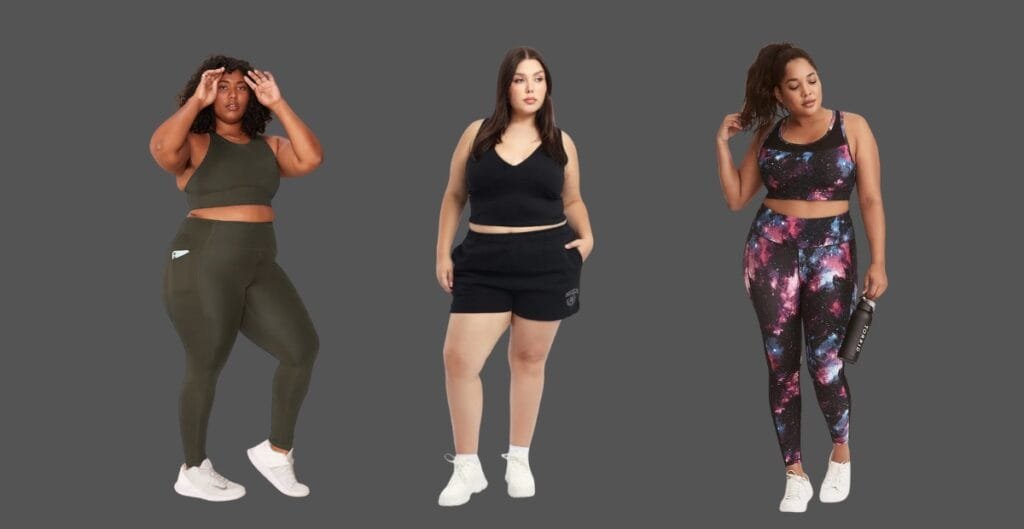 Confident plus-size model wearing a lavender and charcoal color-block activewear set, performing a yoga pose on a sunlit studio floor.