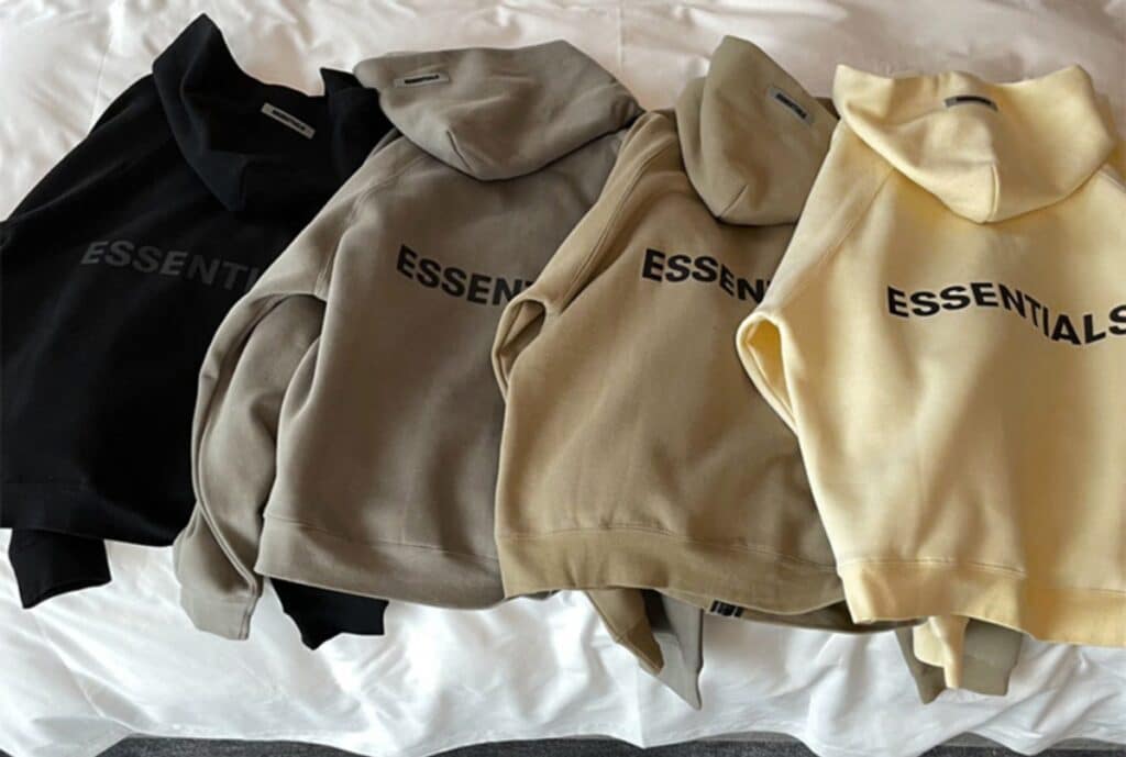 Close-up of an oversized hoodie with extra-long sleeves and a roomy silhouette, folded to show soft fleece interior.