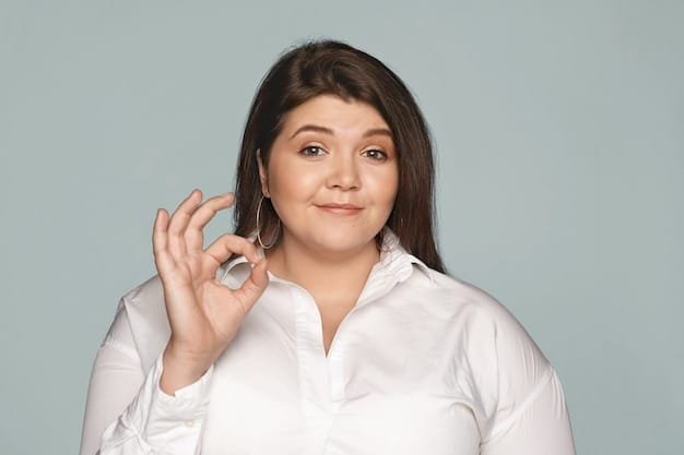 Confident woman wearing a plus-size white button-up shirt styled for everyday wear
