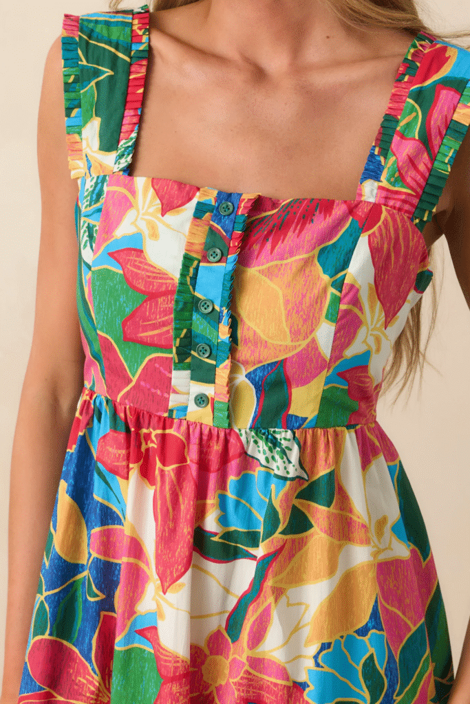 Close-up view of a tropical print beach midi dress