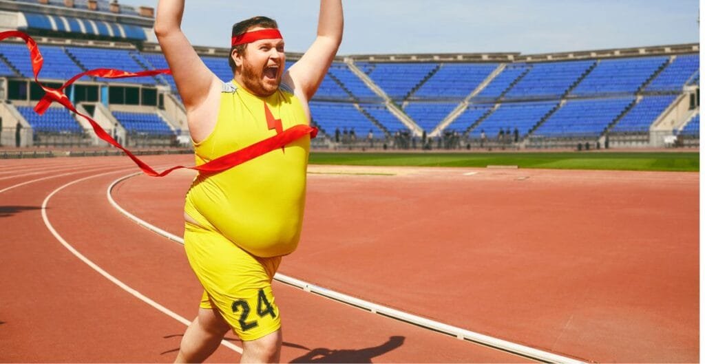 Plus-size man celebrating victory in gym leggings
