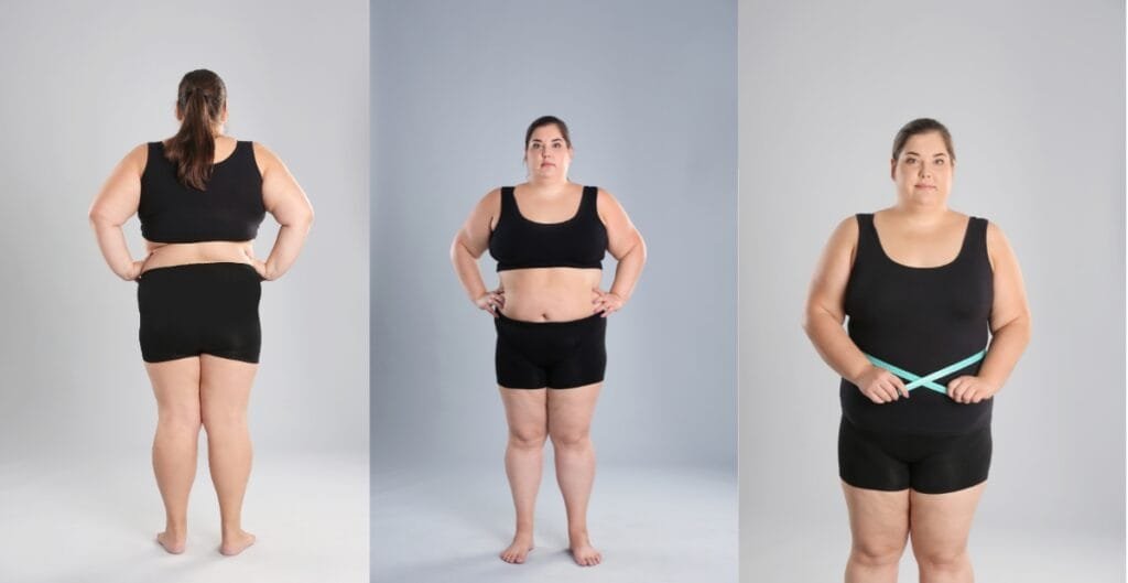 Plus-size woman confidently wearing black exercise shorts with a black tank top, showcasing comfort and flexibility