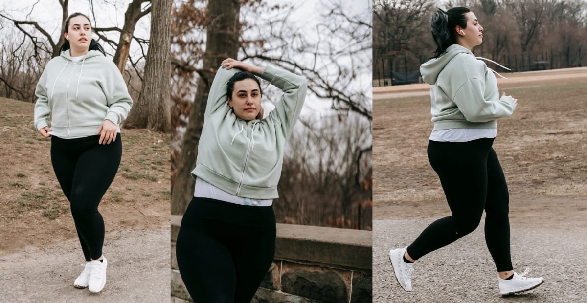 Plus size women jogging outdoors in black workout tights