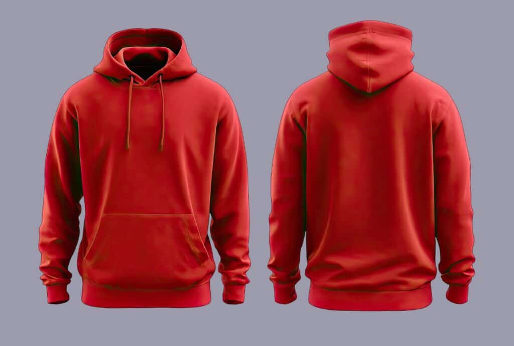 Customer selecting fabric swatches for a luxury hoodie customization with Fashion Soul International.