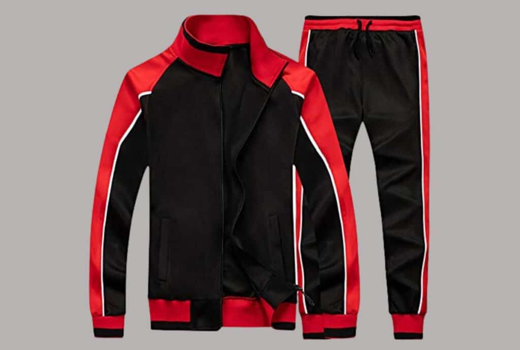 “Logo of a USA tracksuit supplier with a stylized track and bold typography.”