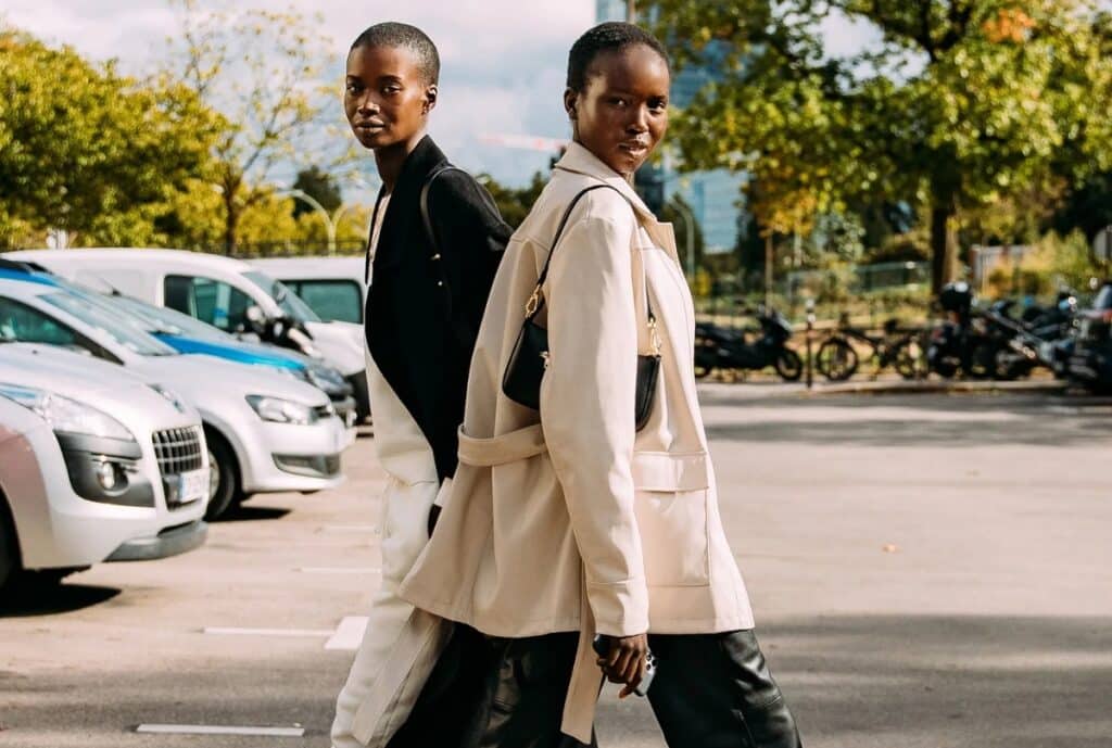 "Interior of a modern apparel showroom showing racks of men’s and women’s casual wear and a logo badge reading ‘Casual Wear Supplier.’"