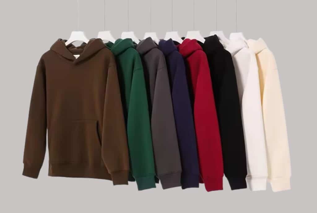 A modern Manchester-based oversized hoodie displayed on a mannequin, featuring a soft fleece interior, oversized fit, and minimalist branding.