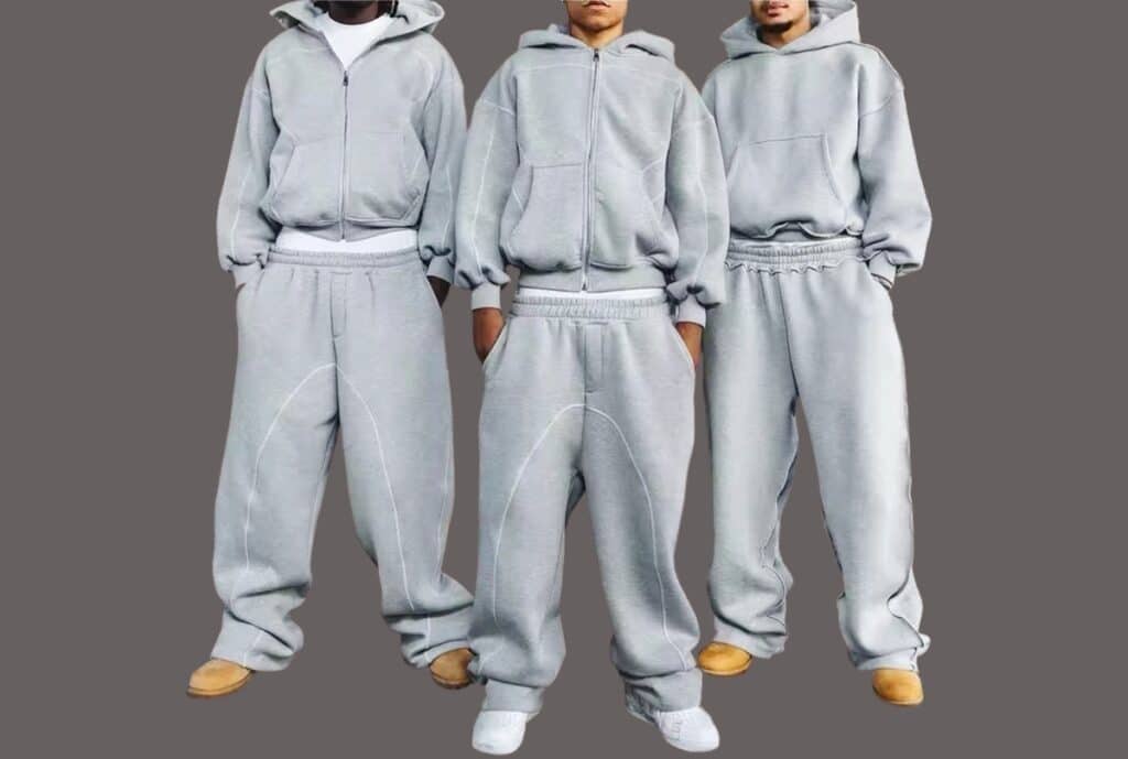 An expansive warehouse floor with racks of packaged sweatsuits ready for shipment in a U.S. distribution center.