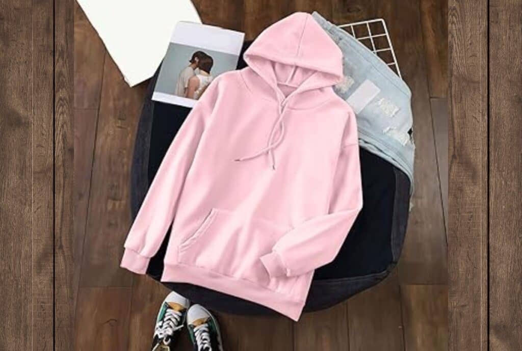 Hoodie with refined details: metal hardware, clean seams, and evenly dyed fabric.