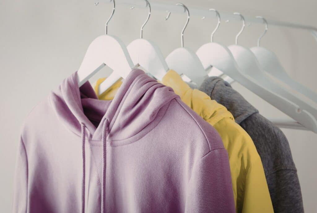 Close-up of Fashion Soul International product labels highlighting quality, sustainability, and innovation.