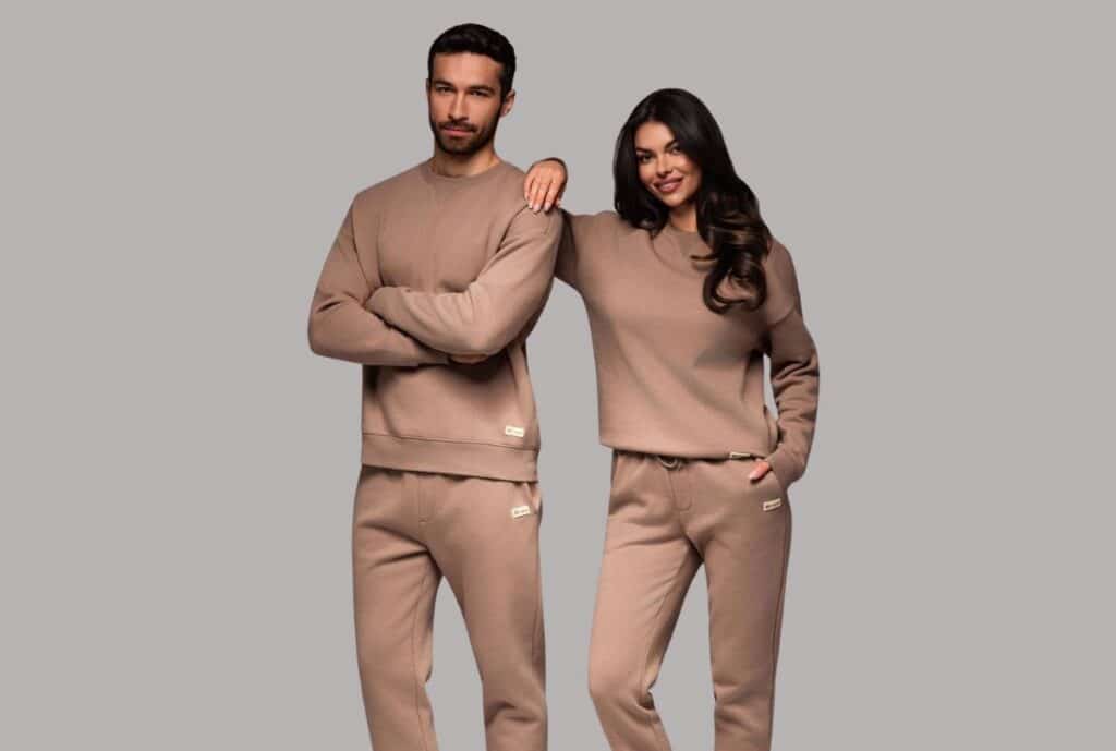 Variety of matching athleisure sweatsuits including joggers, hoodies, and zip-up sets.