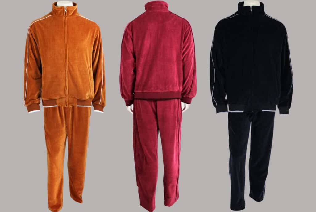 “Close-up of a garment barcode and tag being attached to a navy sweat suit, brand Made in USA.”