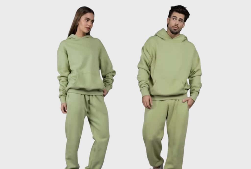 "Close-up of thick fleece fabric on a heavy-weight cotton sweatsuit, showing its brushed interior and durable stitching."