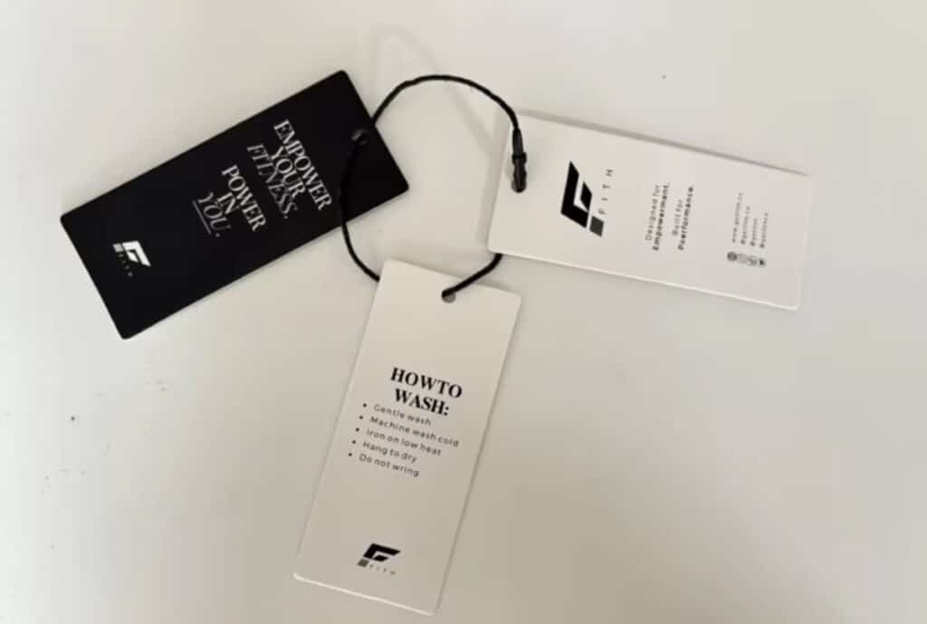 "Close-up of a designer reviewing a private-label casual shirt on a production line in a European manufacturing plant."