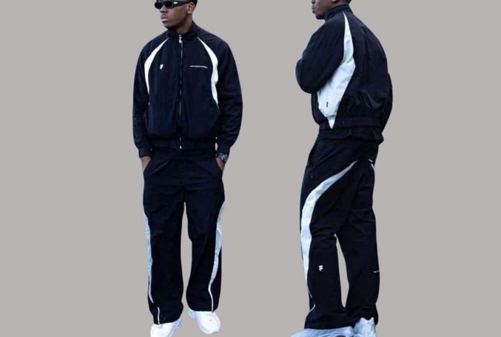 “Black tracksuit with white piping from a USA tracksuit supplier, front view.”