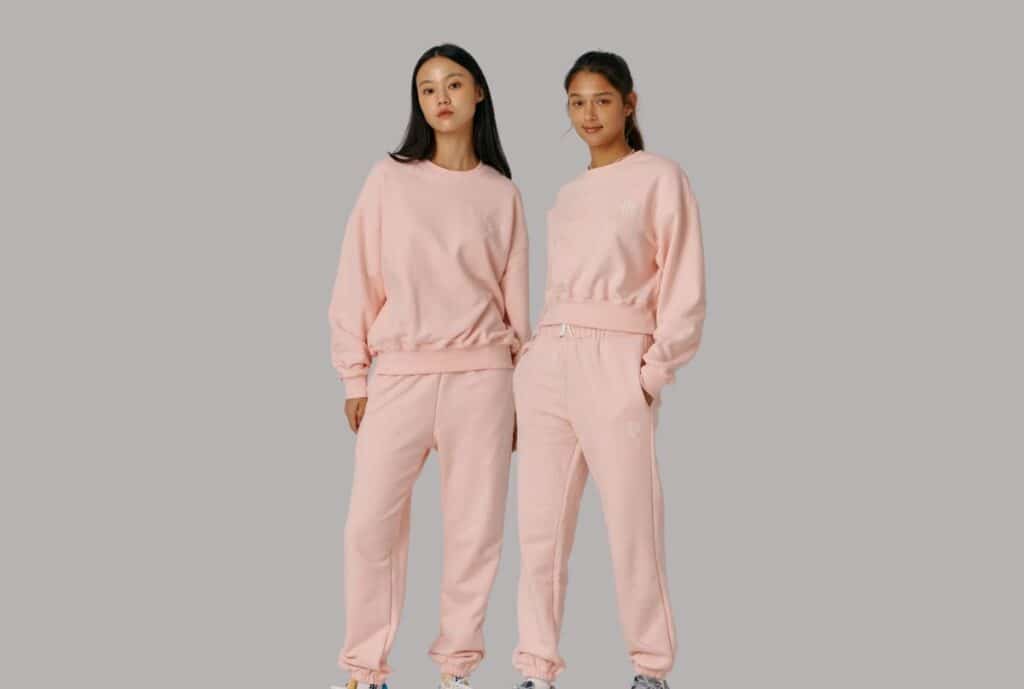Model wearing set: "Model wearing a wholesale sweatsuit set from a USA manufacturer, highlighting fit and comfort."
