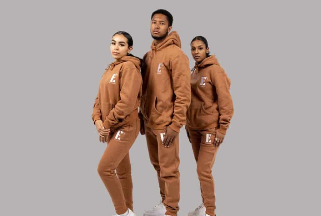 Wholesale fabric swatches and sample athleisure sweatsuits for bulk orders.