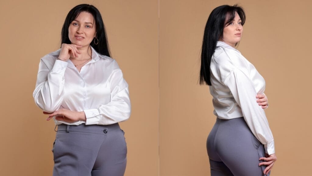 A confident woman wearing white XL pants with a stylish blouse, demonstrating a chic look