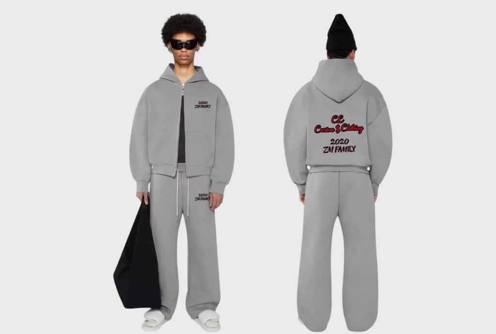 A professional salesperson presenting a sample bulk order of sweatsuits to a client in a Los Angeles showroom.