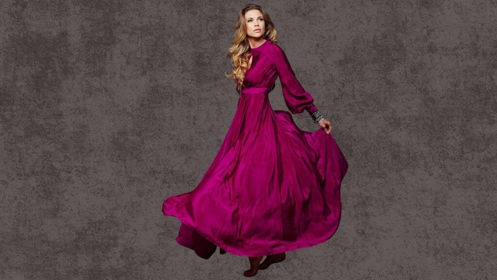 Woman in a flowing purple cocktail dress, size 14, twirling against a dark background