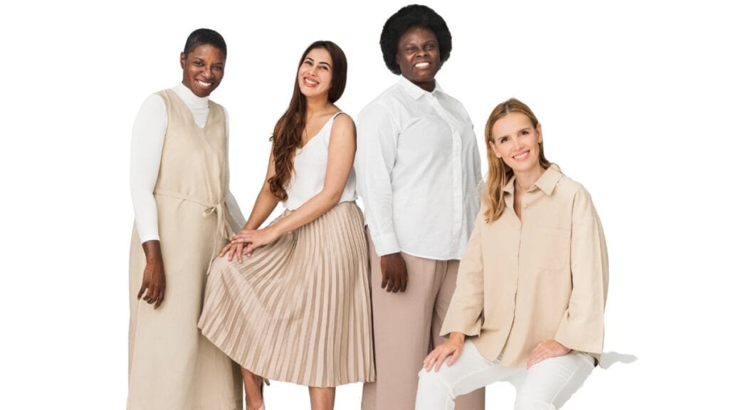 Fashion attire female: diverse women in light, elegant clothing showcasing a relaxed and sophisticated style