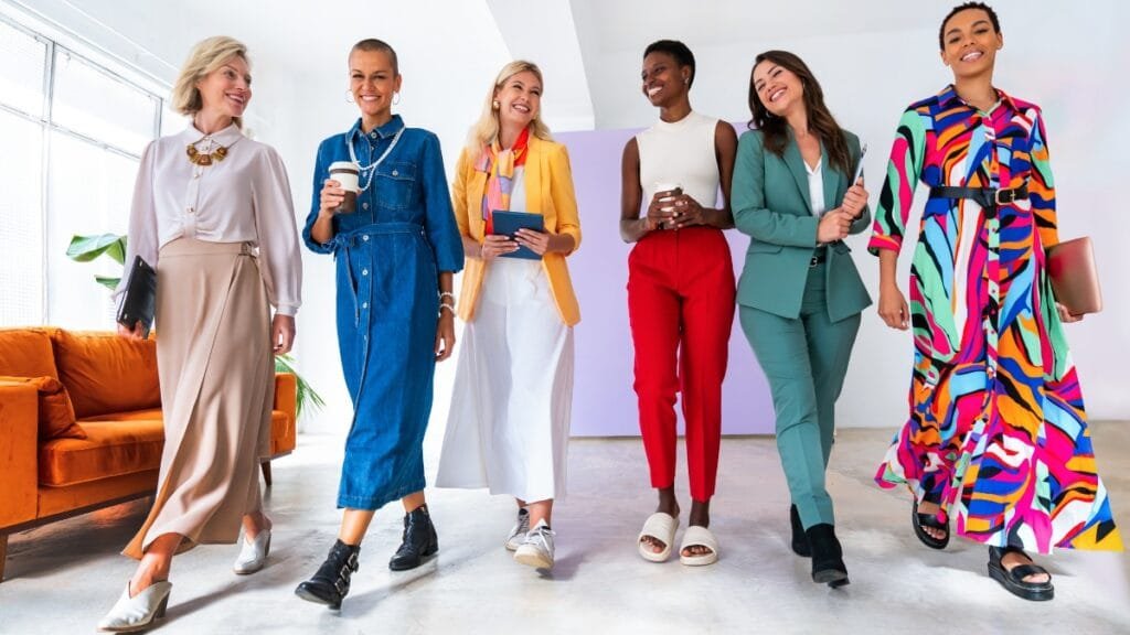Fashion attire female: confident women in colorful outfits showcasing vibrant and trendy fashion styles