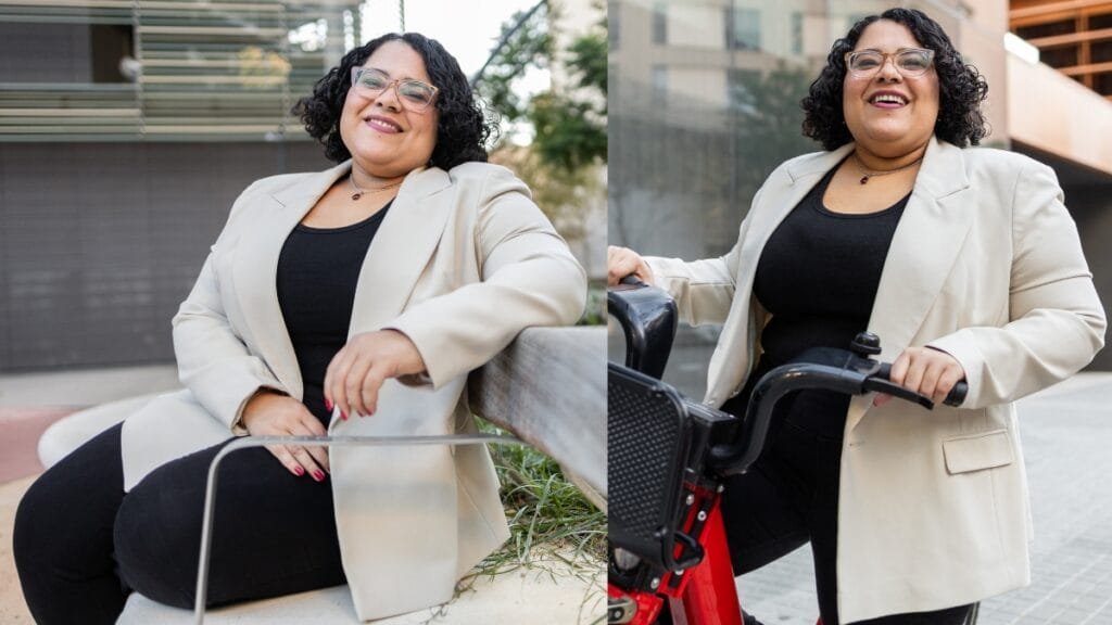 Plus size woman in a chic cream blazer paired with black pants, radiating confidence and elegance