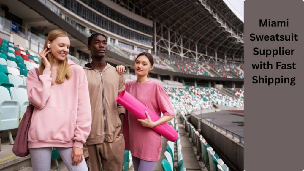 A stylish Miami-themed sweatsuit on a hanger in a bright, sunlit showroom, highlighting lightweight fabric and modern design.