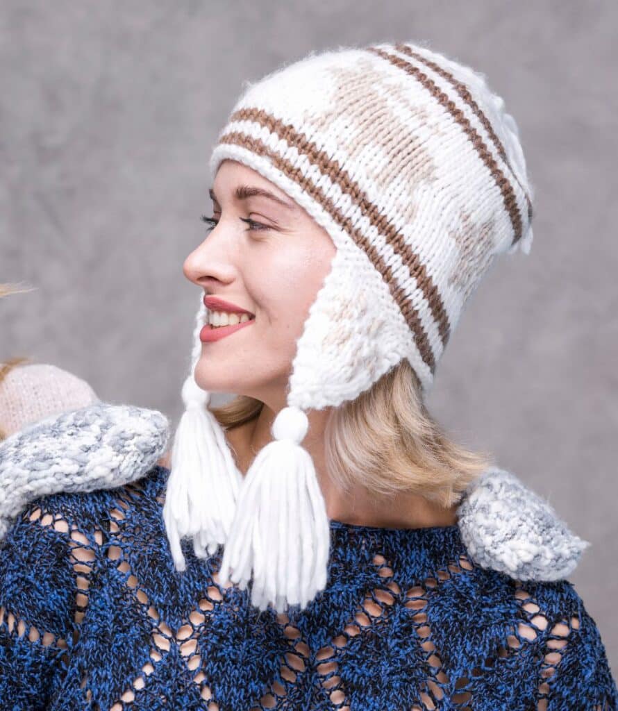 "Close-up of handmade beanies stacked on shelves in a warehouse, marking a USA-based supplier."