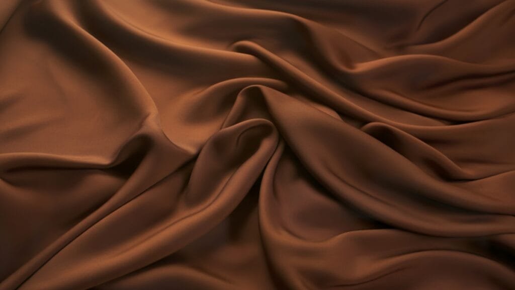  Smooth and glossy brown fade-resistant fabric draped elegantly