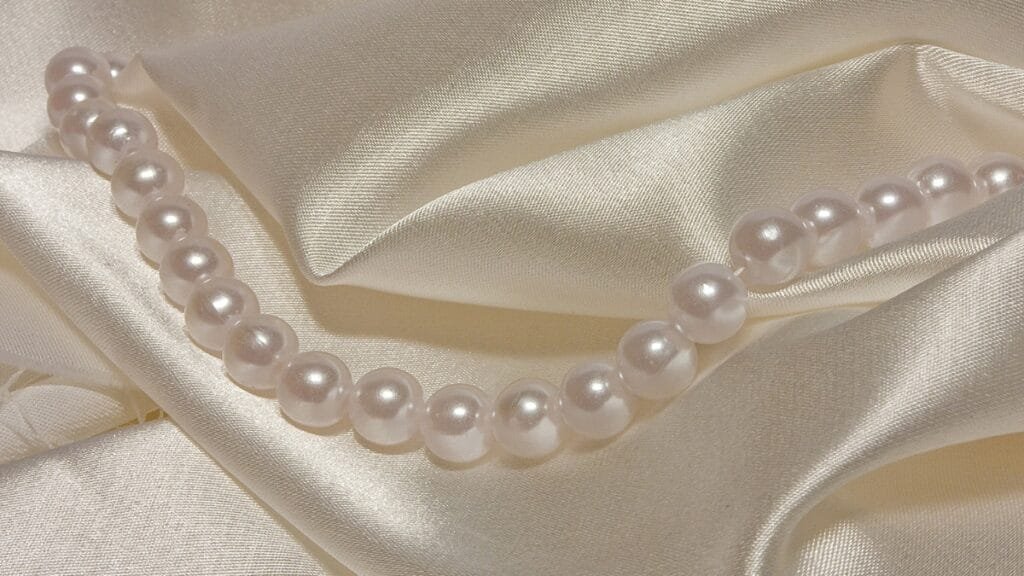 A softest cloth material bolts in white showcasing fabric textures
