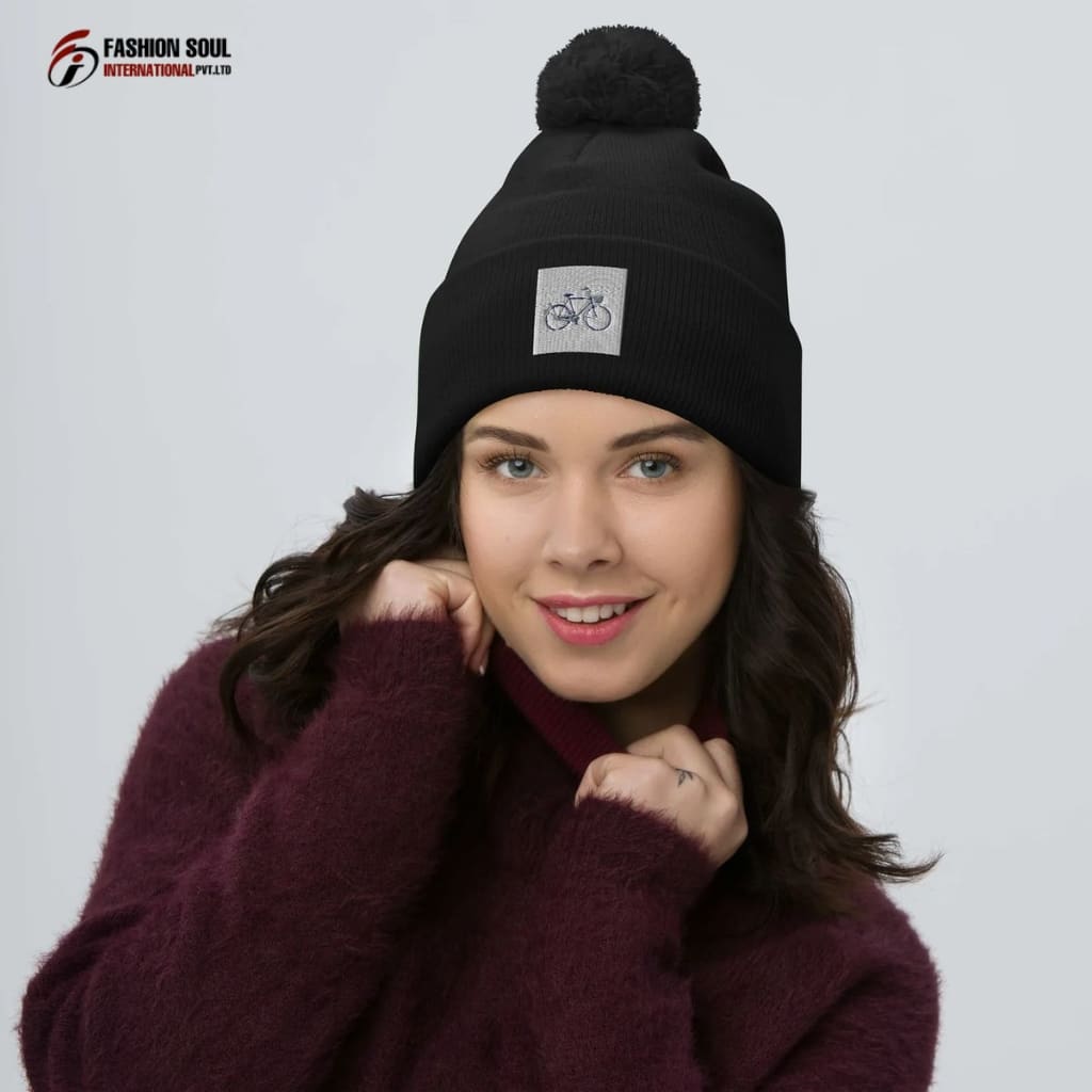 "Custom beanie being embroidered with a Maryland state flag patch"