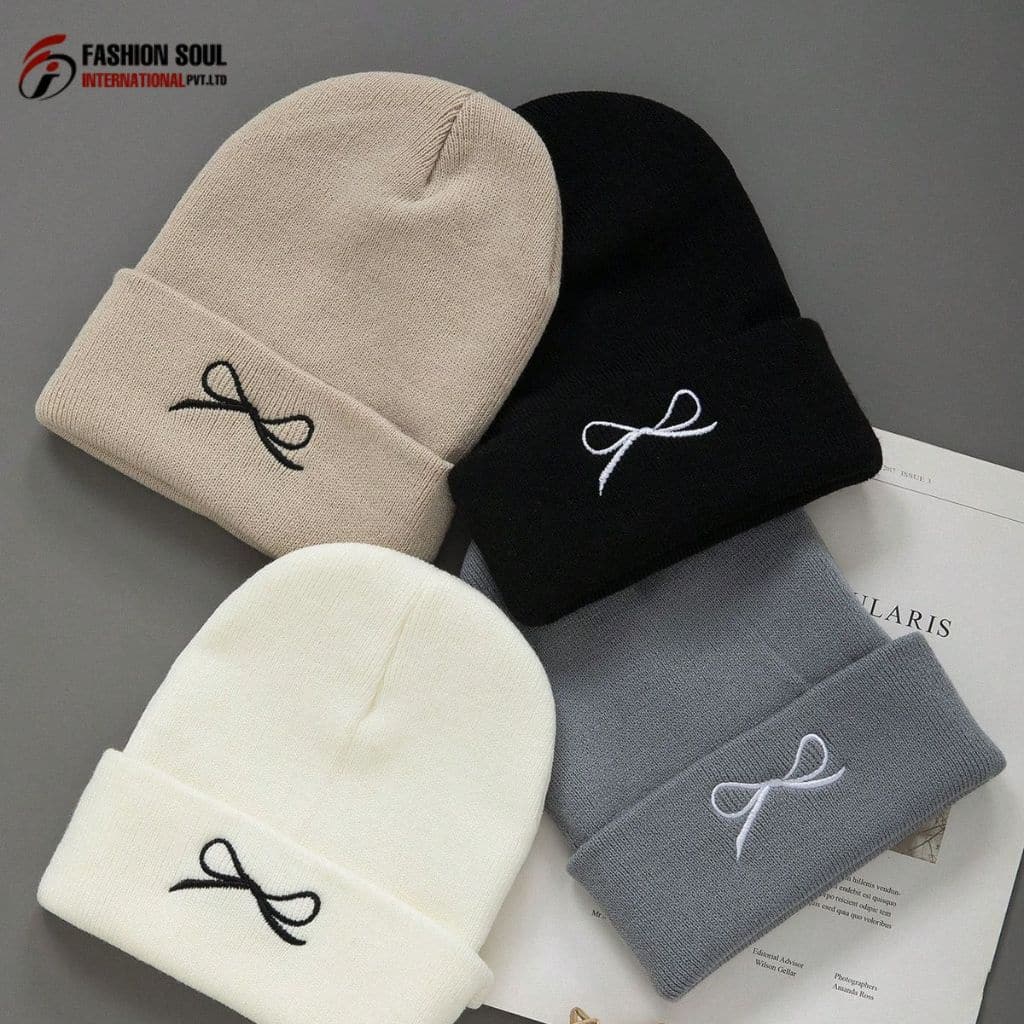 “Row of knitted beanies in different colors on a production line in Washington.”