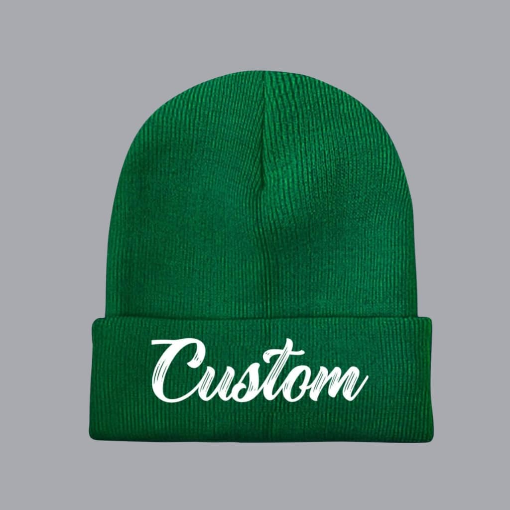 Close-up of embroidery on a knit beanie with a branded logo, North Carolina-based facility in the background.