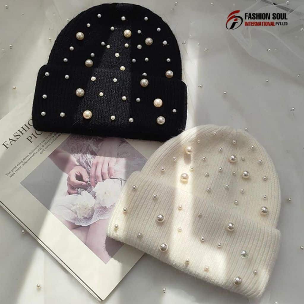 “Close-up of hands stitching a custom beanie at a Washington factory.”