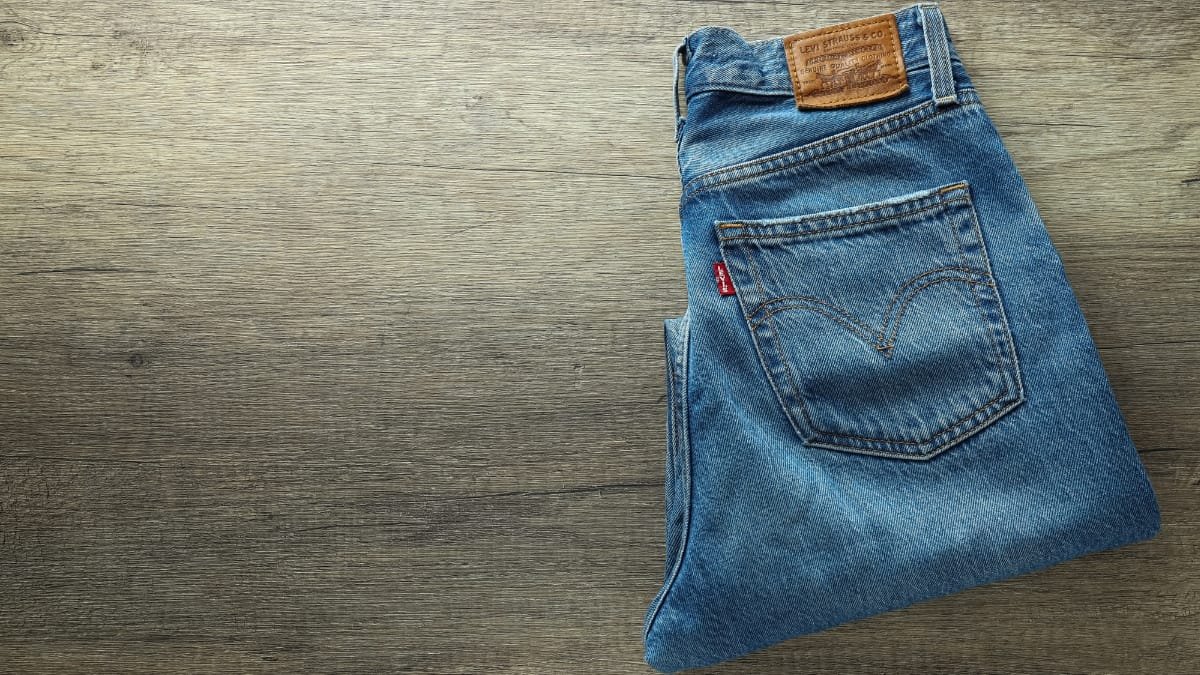 Pair of blue jeans with a classic back pocket design