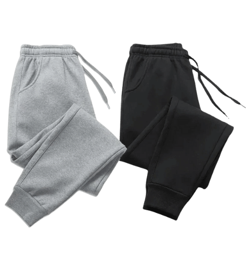 Men's eco-friendly black joggers made from organic cotton, featuring a slim fit design with sustainable fabric and ethical production practices. Women's grey joggers crafted from recycled materials, offering a comfortable fit with an elastic waistband, produced under international sustainability standards.