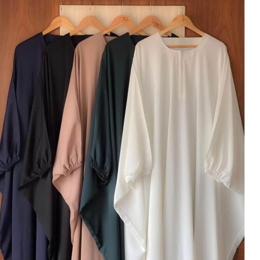 4 abayas in a row. custom abaya manufacturer.
