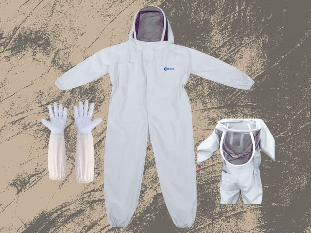 A set of honey bee suits including a full-body protective suit with hood, a pair of white gloves, and a smaller protective suit style jacket, all designed for beekeeping.